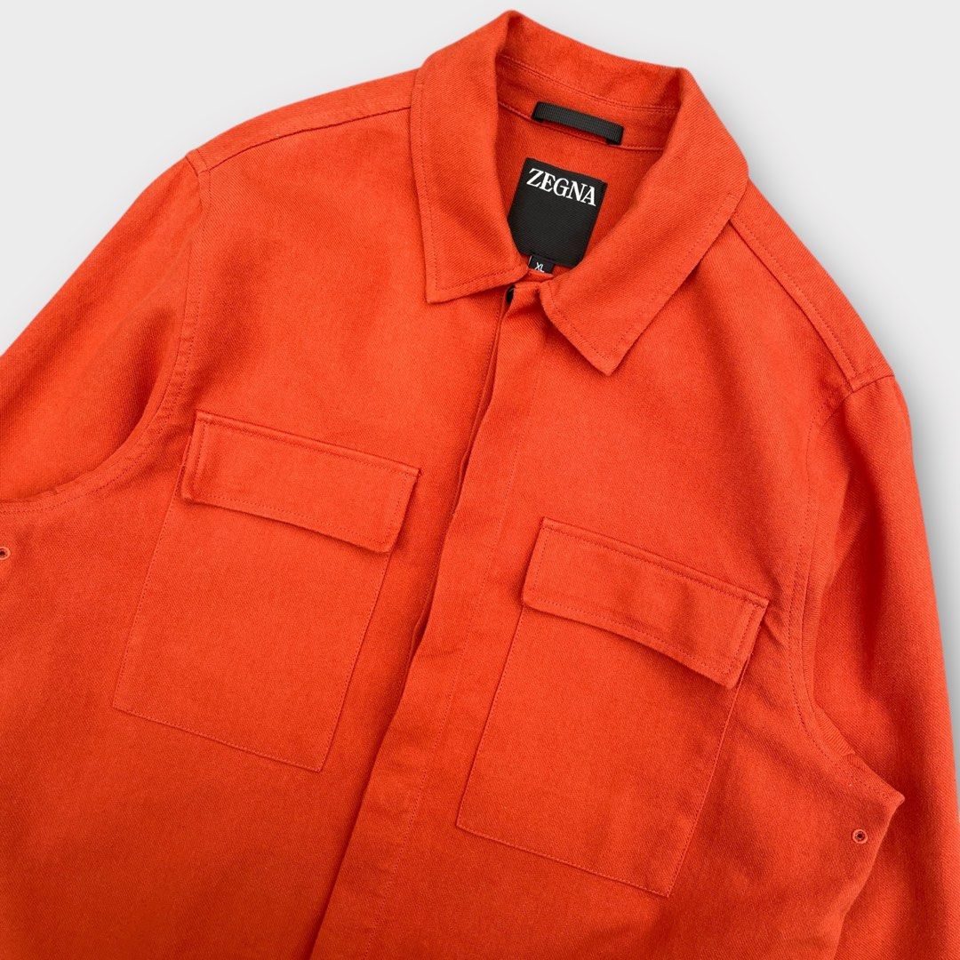 ZEGNA - Linen Overshirt Jacket Orange (Category: Coats, Jackets and Outerwear) located in Los Banos. Submitted by declutterking (Listing ID 1397521756, Image 3). Description: Size XL on tag Made in Italy from 100% linen, this soft long-sleeve overshirt is detailed with a classic collar and buttoned cuffs. Featuring a straight hem, this shirt is completed with flap pockets and concealed buttons. Dimensions: 17.5" shoulders 23" chest 29.5" length 2