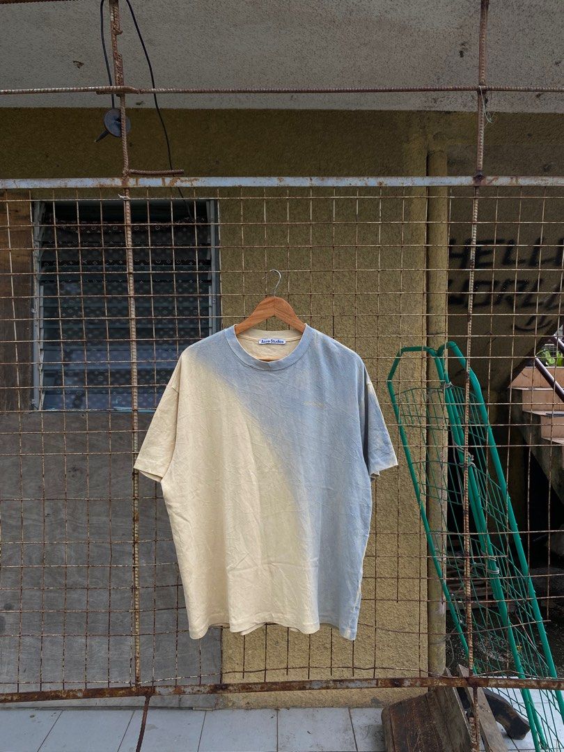 Acne Studios Oversized T-shirt (Category: Tshirts & Polo Shirts ) located in Manila. Submitted by jeremydeas56388 (Listing ID 1397739255, Image 3). Description: - Acne Studios oversized t-shirt - Unique color combination - Features Acne Studios logo (neck label & chest embroidery) - Made in Portugal - 100% cotton - Relaxed fit - Perfect for casual wear - Size tag visible in images.
