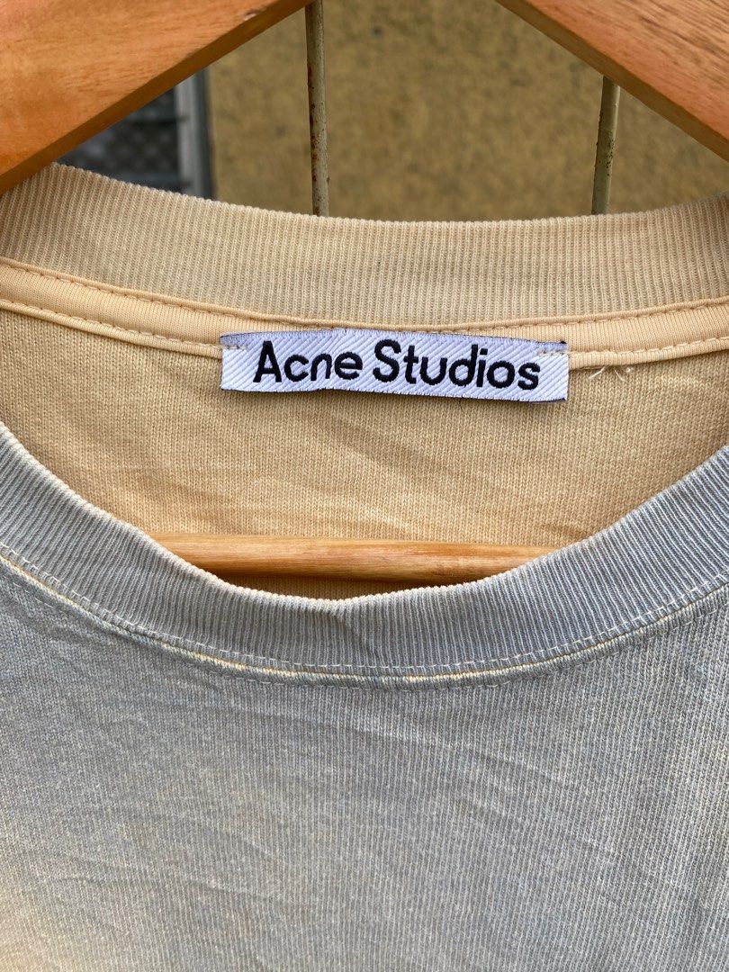 Acne Studios Oversized T-shirt (Category: Tshirts & Polo Shirts ) located in Manila. Submitted by jeremydeas56388 (Listing ID 1397739255, Image 2). Description: - Acne Studios oversized t-shirt - Unique color combination - Features Acne Studios logo (neck label & chest embroidery) - Made in Portugal - 100% cotton - Relaxed fit - Perfect for casual wear - Size tag visible in images.