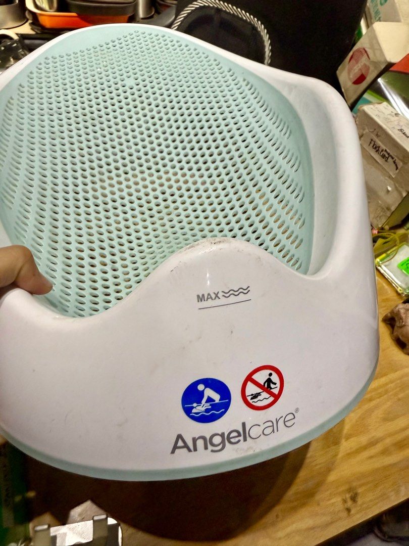 Angelcare Soft Touch Bath Support (Category: Bathtub & Bath Accessories) located in Pilar. Submitted by faveanyshop (Listing ID 1397707731, Image 3). Description: - Angelcare Soft Touch Bath Support for babies. - Perforated design for water drainage. - Comfortable, ergonomic shape. - Includes maximum water level indicator. - Provides a safe bathing experience. - Easy to clean and store..