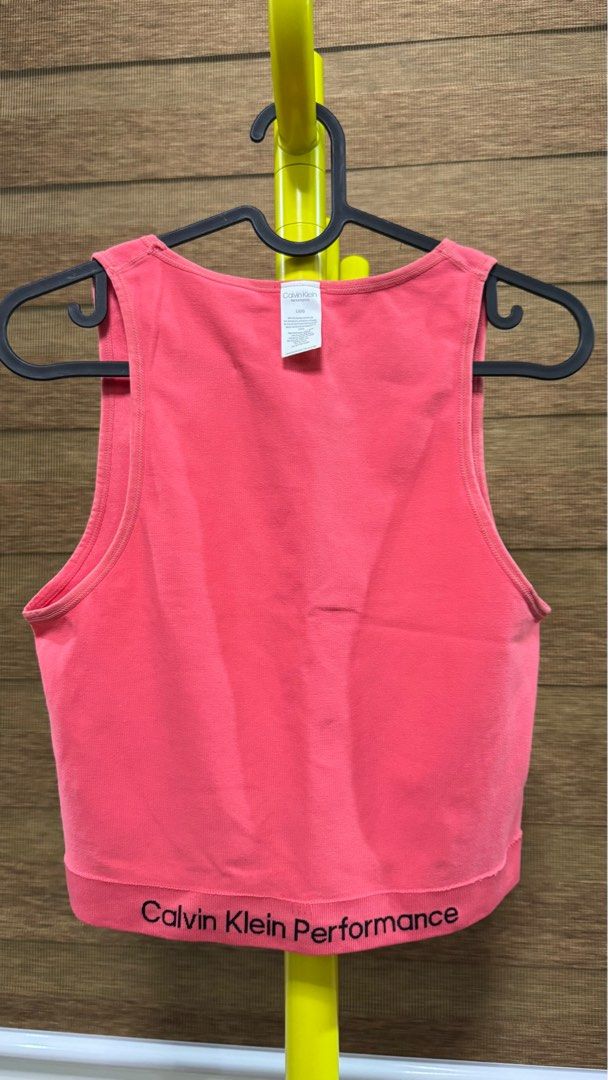 Calvin Klein Performance V-neck Top (Category: Activewear) located in Manila. Submitted by lbdeclutters (Listing ID 1397679318, Image 2). Description: .