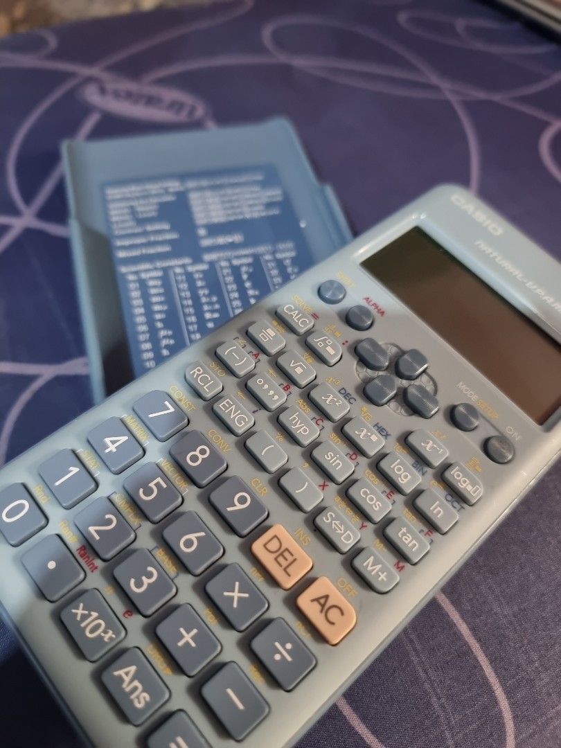 Casio fx-570ES Plus Calculator (Category: Office & Business Technology) located in Manila. Submitted by nichidobra76051 (Listing ID 1397659221, Image 2). Description: Negotiable Price. Good as new calculator. With Box and Manuals. No dents or issues. With Shift Solve. Can do Meet up if around PUP Manila/SM Sta. Mesa or Courier delivery..