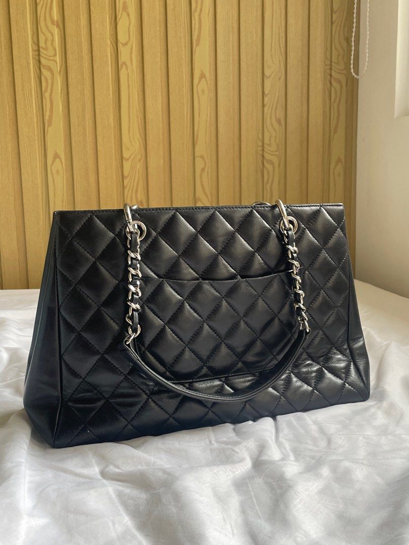 Chanel Black Quilted Shopping Tote (Category: Luxury Bags & Wallets) located in Las Pinas. Submitted by serialthrifter (Listing ID 1397661685, Image 2). Description: Chanel black quilted shopping tote with scarf detailing in the strap. Beautiful and still in great condition in actual. Pre-owned by my mom but she doesn’t use it anymore. Price is negotiable but no low ballers please. Repriced because I can’t vouch for 100% authenticity but it can p