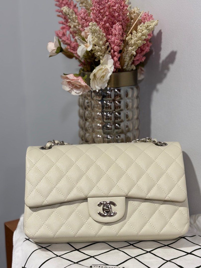 Chanel Double Flap Medium (Category: Luxury Bags & Wallets) located in Muntinlupa City. Submitted by jdvcloset (Listing ID 1397595716, Image 1). Description: Chanel Double flap Medium Caviar Off white color Silver Hardware Microchipped .
