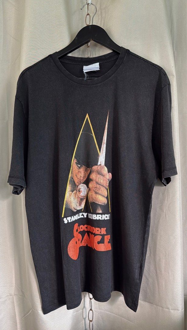 CLOCKWORK ORANGE (Category: Tshirts & Polo Shirts ) located in Manila. Submitted by handpickedshirts (Listing ID 1397619184, Image 1). Description: Brand new, cut tags Faded black fabric, cracked-like prints (style) Approx L28in W21in laid flat No backprint.