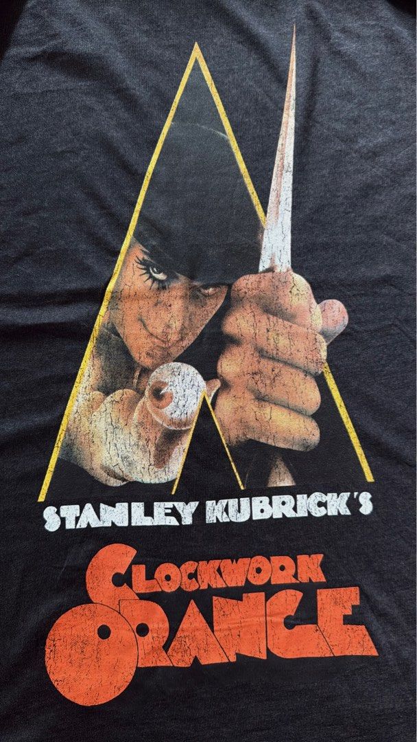 CLOCKWORK ORANGE (Category: Tshirts & Polo Shirts ) located in Manila. Submitted by handpickedshirts (Listing ID 1397619184, Image 2). Description: Brand new, cut tags Faded black fabric, cracked-like prints (style) Approx L28in W21in laid flat No backprint.
