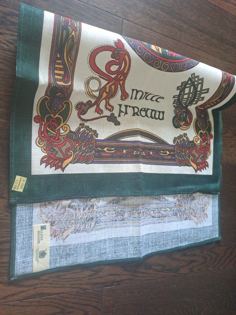 English Heritage Celtic Design Tablecloth (Category: Table Linen & Textiles) located in Manila. Submitted by joanbalde39643 (Listing ID 1397634894, Image 2). Description: Ulster Weavers Gaelic Design Irish Linen Tea Towel is a kitchen towel made in Ireland featuring a Celtic design inspired by the Book of Kells. This specific towel is a "Gaelic Design" or "Celtic Celebrations" model from the company Ulster Weavers. The design includes zoomorphic 