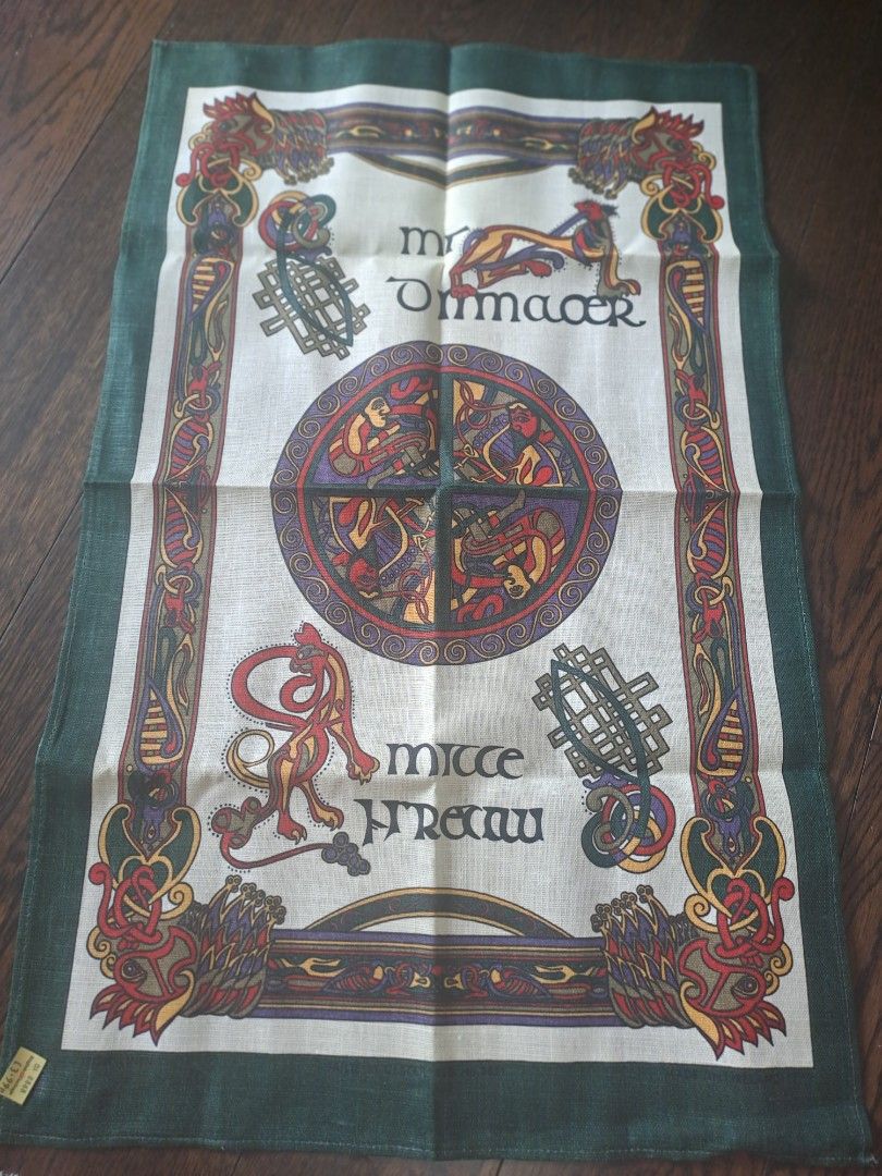 English Heritage Celtic Design Tablecloth (Category: Table Linen & Textiles) located in Manila. Submitted by joanbalde39643 (Listing ID 1397634894, Image 1). Description: Ulster Weavers Gaelic Design Irish Linen Tea Towel is a kitchen towel made in Ireland featuring a Celtic design inspired by the Book of Kells. This specific towel is a "Gaelic Design" or "Celtic Celebrations" model from the company Ulster Weavers. The design includes zoomorphic 