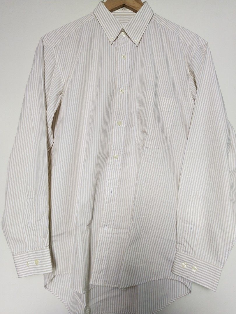 G2000 | Striped Button-down shirt (Category: Formal Shirts) located in Batangas. Submitted by second_cycle (Listing ID 1397641296, Image 3). Description: •100% cotton from Japan (on tag) •white fabric w/ light brown candy stripes •18" shoulders •22.5" width •23.5" sleeves •32" length from collar •button-down collar lightly worn, oversized on me but no longer worn much ✅ no rips or loose threads ✅ no stains; original buttons 🫧 recently washed and