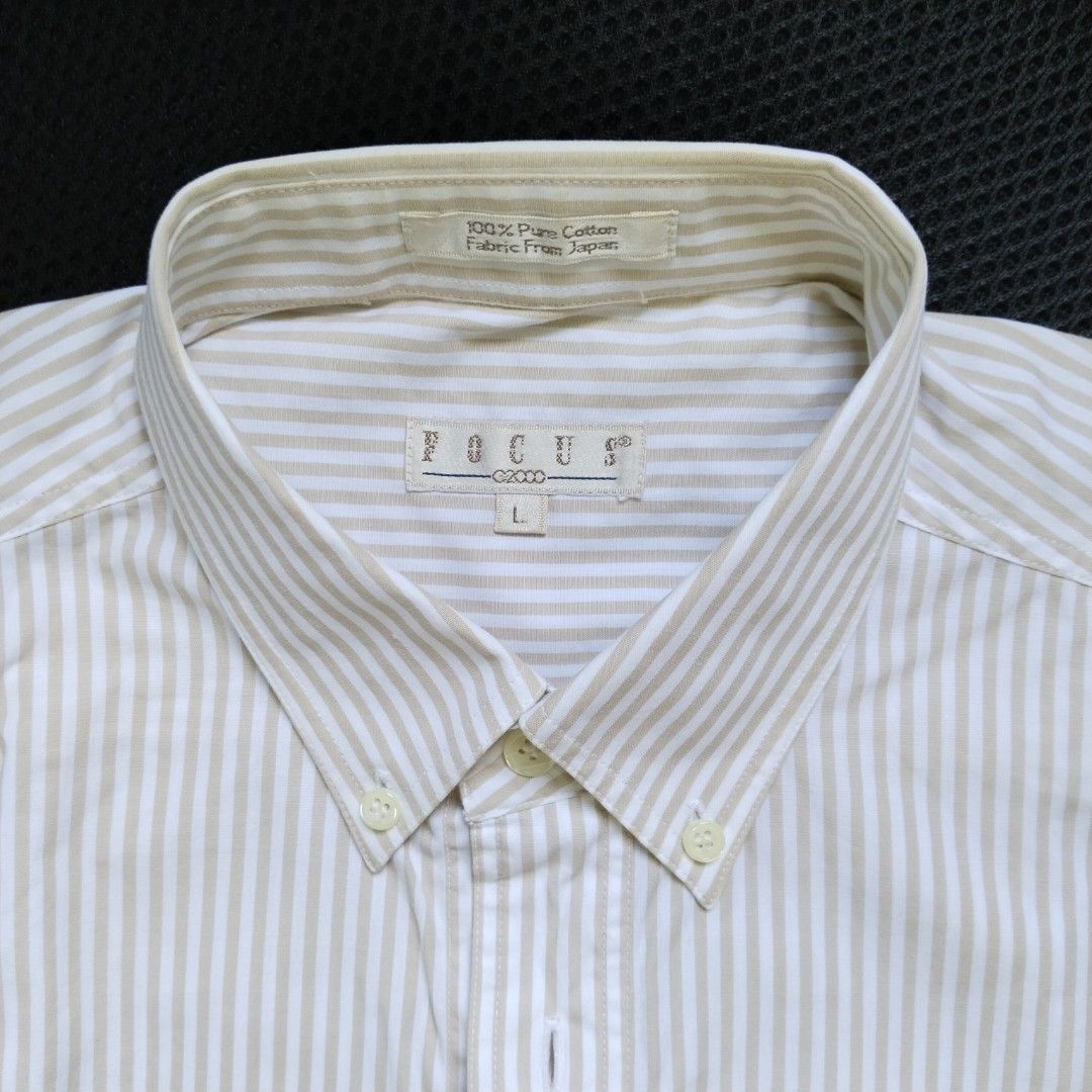 G2000 | Striped Button-down shirt (Category: Formal Shirts) located in Batangas. Submitted by second_cycle (Listing ID 1397641296, Image 1). Description: •100% cotton from Japan (on tag) •white fabric w/ light brown candy stripes •18" shoulders •22.5" width •23.5" sleeves •32" length from collar •button-down collar lightly worn, oversized on me but no longer worn much ✅ no rips or loose threads ✅ no stains; original buttons 🫧 recently washed and