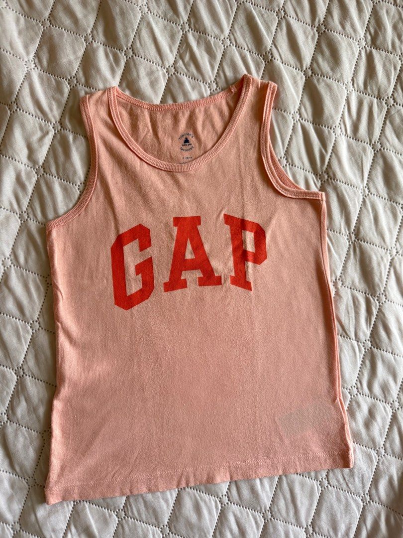 Gap Tank Top Boys Kids (Category: Babies & Kids Fashion) located in Mapandan. Submitted by feanner (Listing ID 1397617977, Image 1). Description: - Brand: Gap - Style: Tank Top - Size: 4 years - Condition: Excellent addition to your child's wardrobe. Disclaimer: All items are first hand used and bought brand new, hence, rest assured that all items are handled with care. .