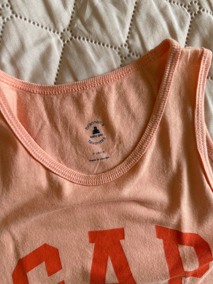 Gap Tank Top Boys Kids (Category: Babies & Kids Fashion) located in Mapandan. Submitted by feanner (Listing ID 1397617977, Image 2). Description: - Brand: Gap - Style: Tank Top - Size: 4 years - Condition: Excellent addition to your child's wardrobe. Disclaimer: All items are first hand used and bought brand new, hence, rest assured that all items are handled with care. .