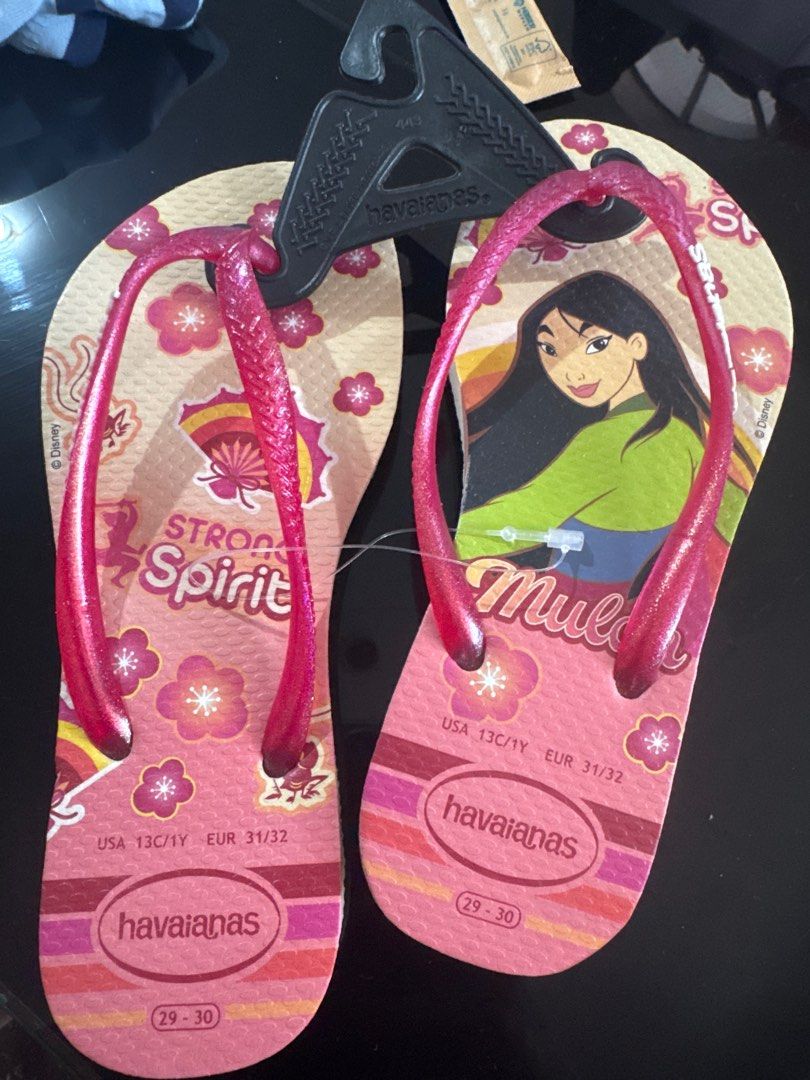 Havaianas Mulan Flip-Flops Size 29-30 (Category: Babies & Kids Fashion) located in Marikina City. Submitted by phoebea15 (Listing ID 1397586461, Image 1). Description: Brand new (duplicate pair) - Havaianas flip-flops with Mulan design - Size: 29-30 - Strap color: Pink - Features a floral pattern - Visible Havaianas logo .