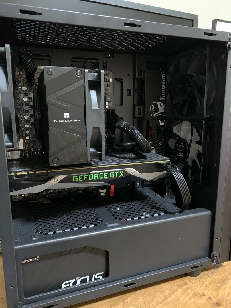 Intel i7-4790 Gaming Build (Category: Desktops) located in Pasig City. Submitted by migsj (Listing ID 1397625873, Image 2). Description: Well maintained personal gaming computer: Intel i7 4790 Asus H97M-E Ddr3 Micro-Atx Kingston HyperX Fury 1866MHz 16Gb Ddr3 Kingston KC600 512Gb SSD Gtx 1080 Founders Edition Seasonic Focus GX-550 550W 80+ Gold Fully Modular Thermalright Assassin Spirit 120 Evo Dark Air Cooler Arctic Cooling Fan 120.