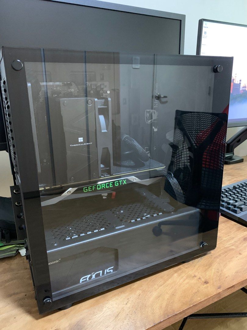 Intel i7-4790 Gaming Build (Category: Desktops) located in Pasig City. Submitted by migsj (Listing ID 1397625873, Image 3). Description: Well maintained personal gaming computer: Intel i7 4790 Asus H97M-E Ddr3 Micro-Atx Kingston HyperX Fury 1866MHz 16Gb Ddr3 Kingston KC600 512Gb SSD Gtx 1080 Founders Edition Seasonic Focus GX-550 550W 80+ Gold Fully Modular Thermalright Assassin Spirit 120 Evo Dark Air Cooler Arctic Cooling Fan 120.