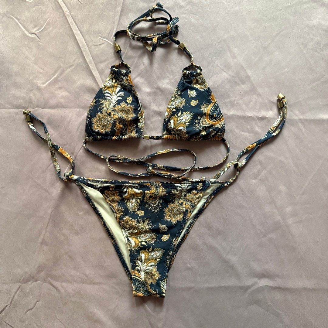 H&M 2 piece bikini set (Category: Bikinis & Swimsuits) located in Makati City. Submitted by avlca (Listing ID 1397645543, Image 1). Description: H&M bikini Fits xs up to s 30 to 32A bust 23 to 25 waist Low to mid waist, semi full coverage RFS: not my size anymore.