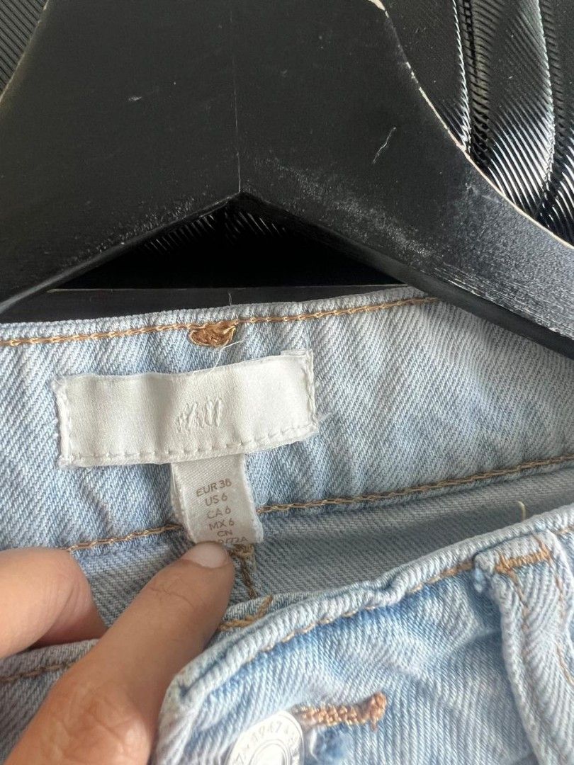 H&M Distressed Wide Leg Jeans (Category: Jeans) located in Makati City. Submitted by gabj6 (Listing ID 1397607951, Image 3). Description: - H&M light wash wide leg jeans - Distressed details on the knees - Size: US 6, CA 6 - Classic five-pocket design - Button and zipper closure - Great for casual wear.