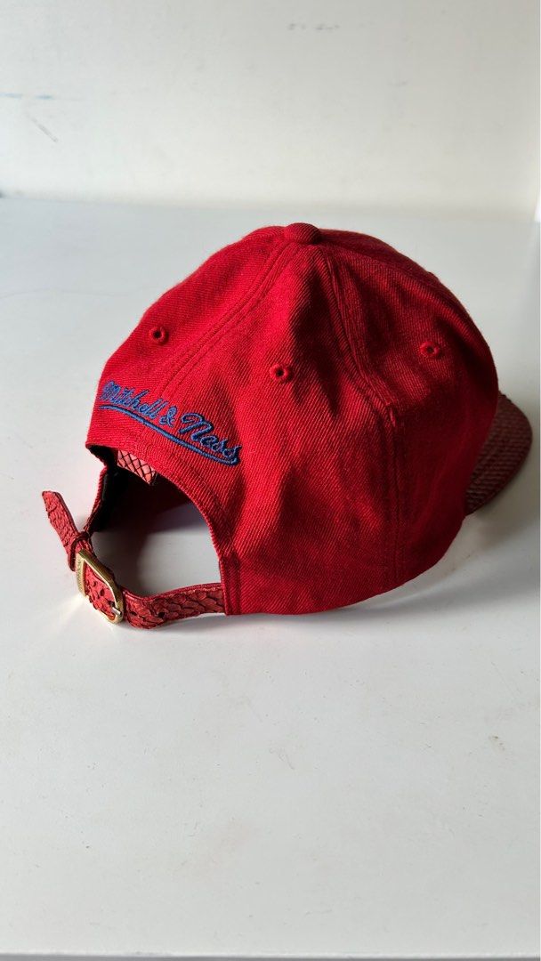 Cap snapback Just don Mitchell & Ness python skin snapback (Category: Cap & Hats) located in Kuala Lumpur. Submitted by dannythekhan (Listing ID 1397718352, Image 3). Description: - authentic just don Sacramento Kings with RSVP label on the inside - real red python snakeskin on brim, red lamb skin under the brim - Mitchell & Ness logo embroidered on back - Adjustable snakeskin strap with gold buckle with just don logo *no lowballer *googgle if yo