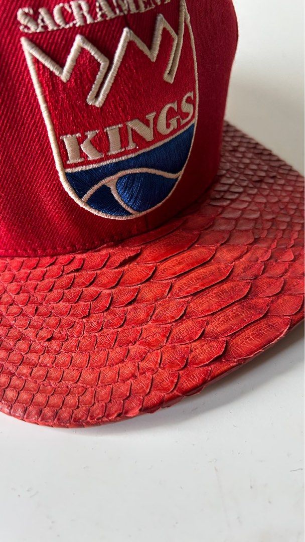 Cap snapback Just don Mitchell & Ness python skin snapback (Category: Cap & Hats) located in Kuala Lumpur. Submitted by dannythekhan (Listing ID 1397718352, Image 2). Description: - authentic just don Sacramento Kings with RSVP label on the inside - real red python snakeskin on brim, red lamb skin under the brim - Mitchell & Ness logo embroidered on back - Adjustable snakeskin strap with gold buckle with just don logo *no lowballer *googgle if yo