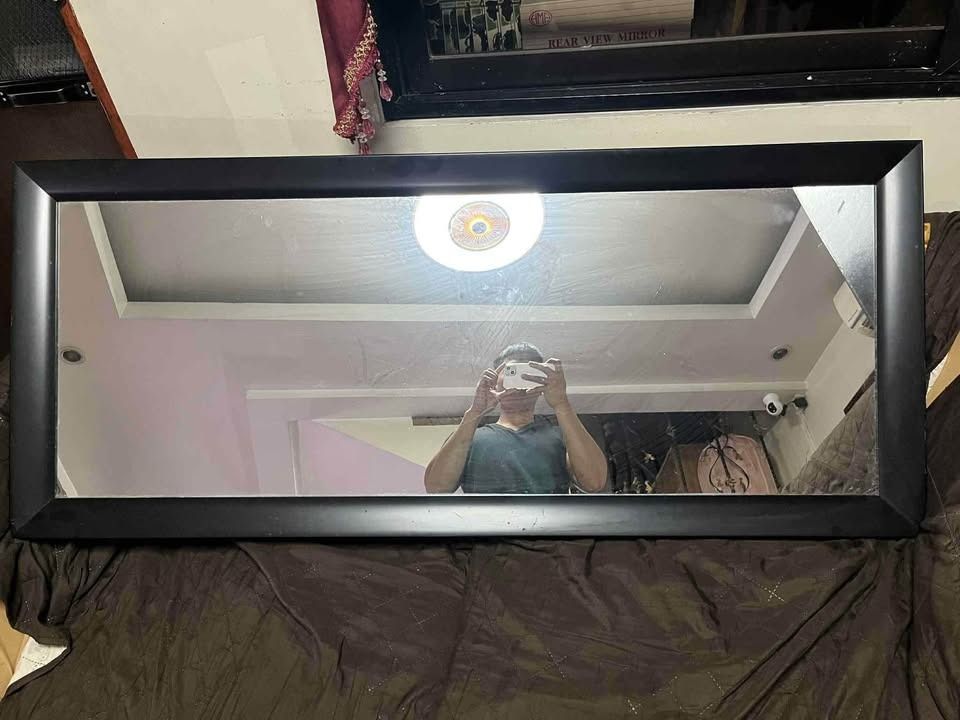 Large Rectangular Black Framed Full Body Mirror (Category: Mirrors) located in Quezon City. Submitted by jaedenry0228 (Listing ID 1397652015, Image 1). Description: - Large rectangular mirror - Stylish black frame with beveled edge - Ideal for living room or bedroom - Great for checking outfits - Helps make rooms appear more spacious - Enhances home decor.