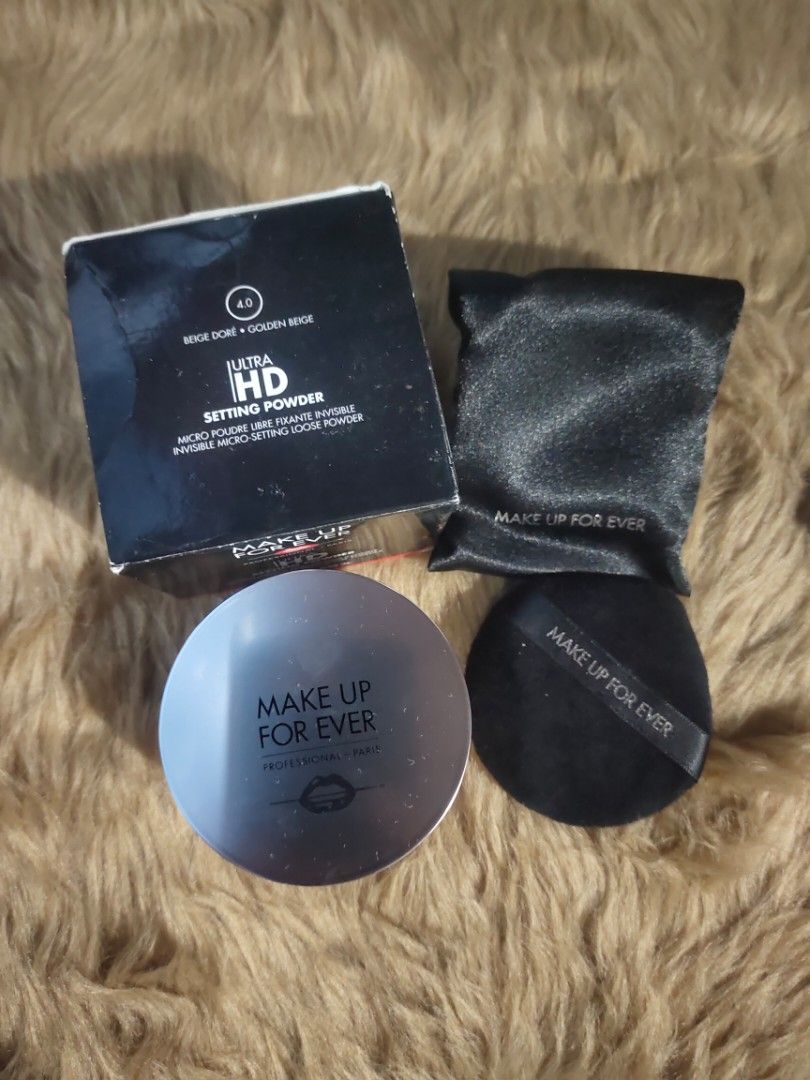 Make Up For Ever Ultra HD Setting Powder (Category: Makeup) located in San Fernando. Submitted by aquiknows (Listing ID 1397757704, Image 1). Description: - Make Up For Ever Ultra HD Setting Powder - Includes powder, puff, pouch, and box - Available Shades: 40 and 11 - Micro-fine, weightless formula - Sets makeup for long-lasting wear - Reduces shine for an airbrushed effect.