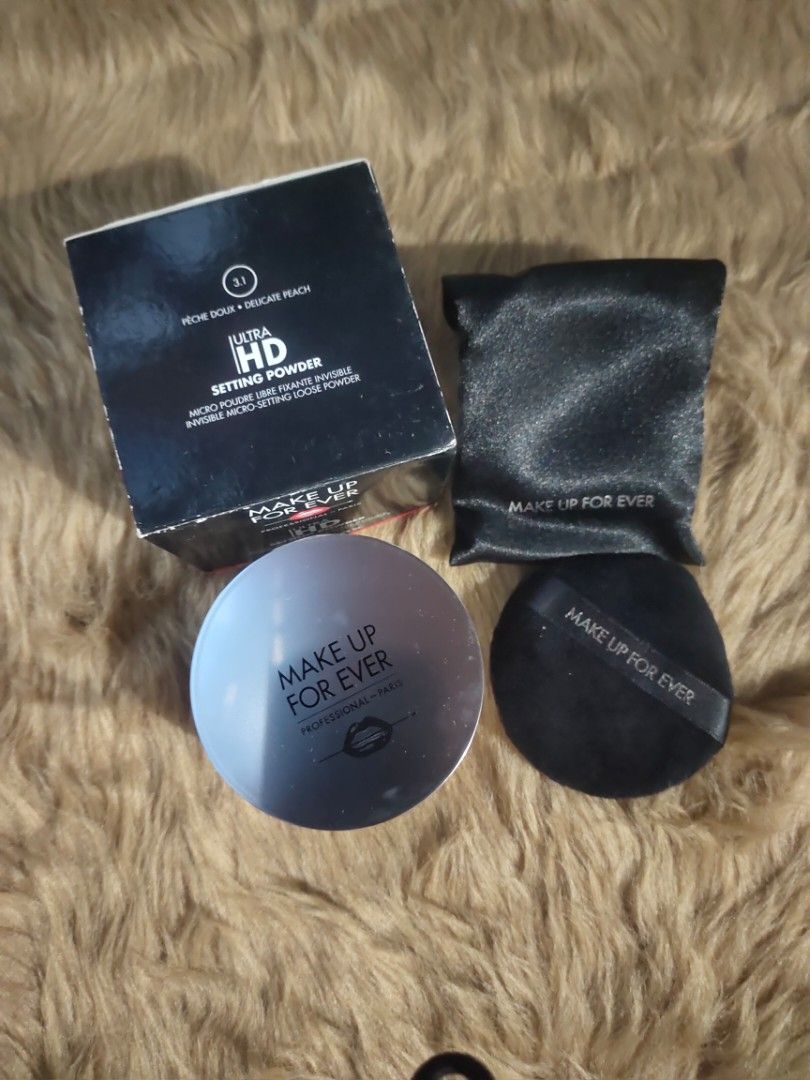 Make Up For Ever Ultra HD Setting Powder (Category: Makeup) located in San Fernando. Submitted by aquiknows (Listing ID 1397757704, Image 2). Description: - Make Up For Ever Ultra HD Setting Powder - Includes powder, puff, pouch, and box - Available Shades: 40 and 11 - Micro-fine, weightless formula - Sets makeup for long-lasting wear - Reduces shine for an airbrushed effect.