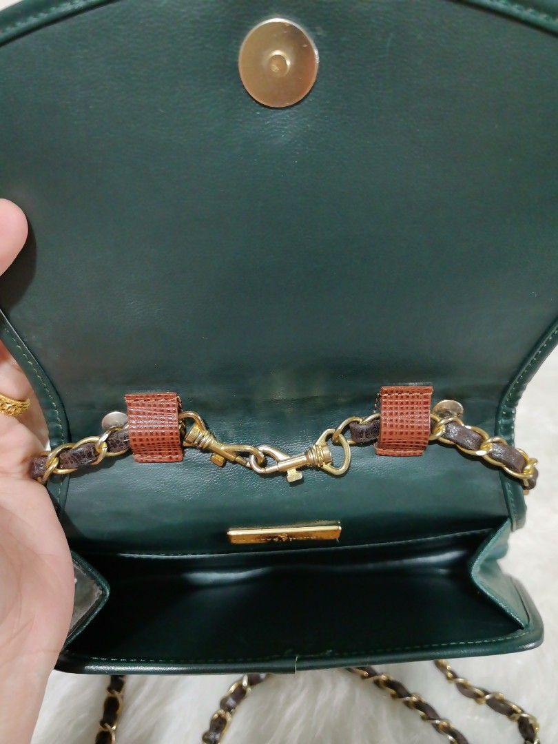 🔹PHILIPPE CHARRIOL LEATHER SLING BAG🔹 (Category: Luxury Bags & Wallets) located in Paranaque City. Submitted by sophiasamcloset (Listing ID 1397606534, Image 2). Description: 🔹💯% GUARANTEED AUTHENTIC / ORIGINAL VINTAGE PHILIPPE CHARRIOL SLING BAG / HANDBAG. 🔹MADE in FRANCE 🔹Unique green exterior with brown accents 🔹inside, one slip pocket 🔹replacement sling included 🔹DIMENSIONS🔹 ➡️Height - 7 inches ➡️Length - 10 inches ➡️Width - 2 inche