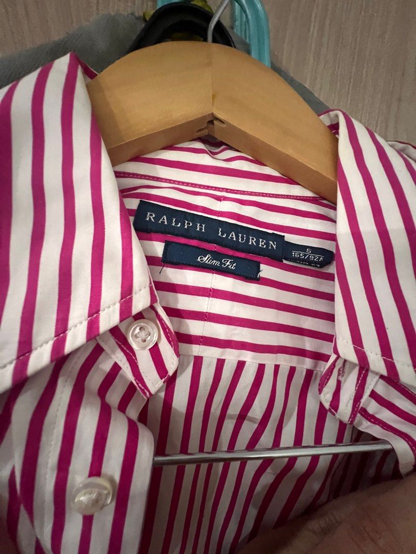 Ralph Lauren Slim Fit Striped Shirt (Category: Longsleeves) located in Pasig City. Submitted by orlyspreloved (Listing ID 1397644621, Image 3). Description: - Ralph Lauren Slim Fit shirt - Vertical stripes - Pink polo logo on chest - Button-down closure - Long sleeves - Size: S (165/82A).