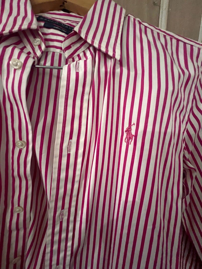 Ralph Lauren Slim Fit Striped Shirt (Category: Longsleeves) located in Pasig City. Submitted by orlyspreloved (Listing ID 1397644621, Image 2). Description: - Ralph Lauren Slim Fit shirt - Vertical stripes - Pink polo logo on chest - Button-down closure - Long sleeves - Size: S (165/82A).