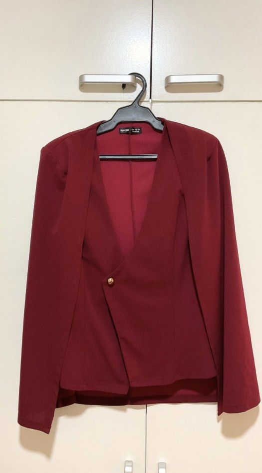Red Suit Set (Category: Sets or Coordinates) located in Mandaluyong City. Submitted by jozelle.soriano (Listing ID 1397716915, Image 3). Description: - Shein red suit set. - Includes cape-style blazer with gold button. (one button missing) - Matching trousers. - Cream-colored blouse with necktie and long sleeves. - Ideal for formal events and professional settings. - Vibrant red color..