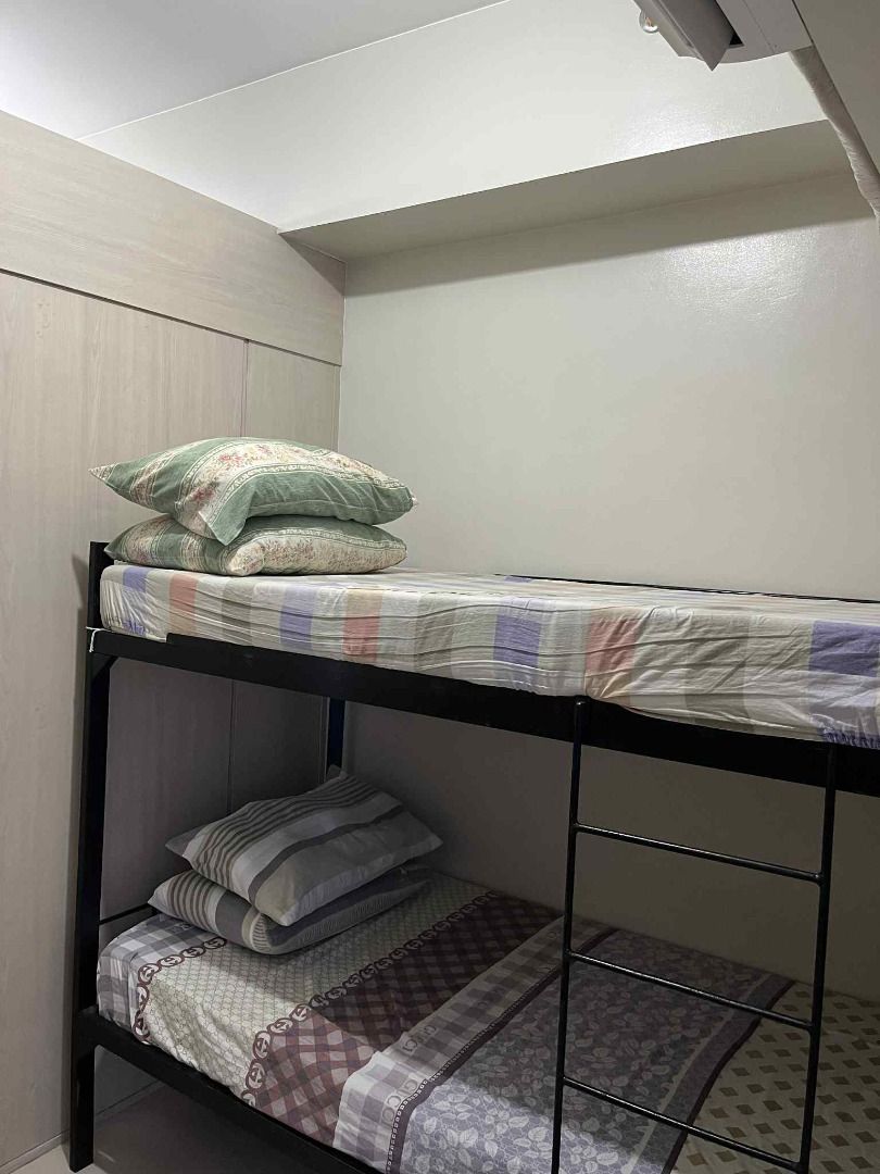Single Size Bunk Bed/Double Deck Mattress and Bed Frame Set (Category: Bed Frames & Mattresses) located in Quezon City. Submitted by jaedenry0228 (Listing ID 1397657038, Image 3). Description: - Single-size bunk bed set. - Includes bed frame and mattresses. - Space-saving design. - Sturdy and durable frame. - Ready for immediate use..