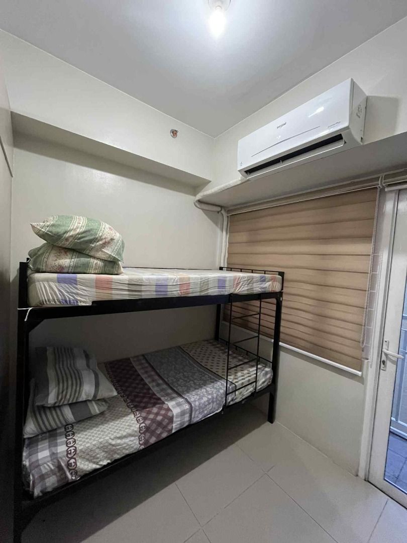 Single Size Bunk Bed/Double Deck Mattress and Bed Frame Set (Category: Bed Frames & Mattresses) located in Quezon City. Submitted by jaedenry0228 (Listing ID 1397657038, Image 2). Description: - Single-size bunk bed set. - Includes bed frame and mattresses. - Space-saving design. - Sturdy and durable frame. - Ready for immediate use..