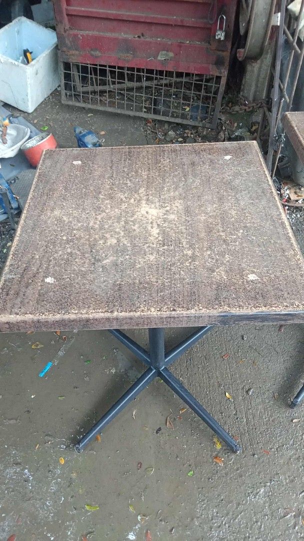 Square Cafe Tables (Category: Tables & Sets) located in Quezon City. Submitted by madelrivera (Listing ID 1397662371, Image 2). Description: - Square cafe tables - Dark brown tabletop - Black metal base - Swivel base - Suitable for indoor or outdoor use - Sold as is 2pcs 1700.