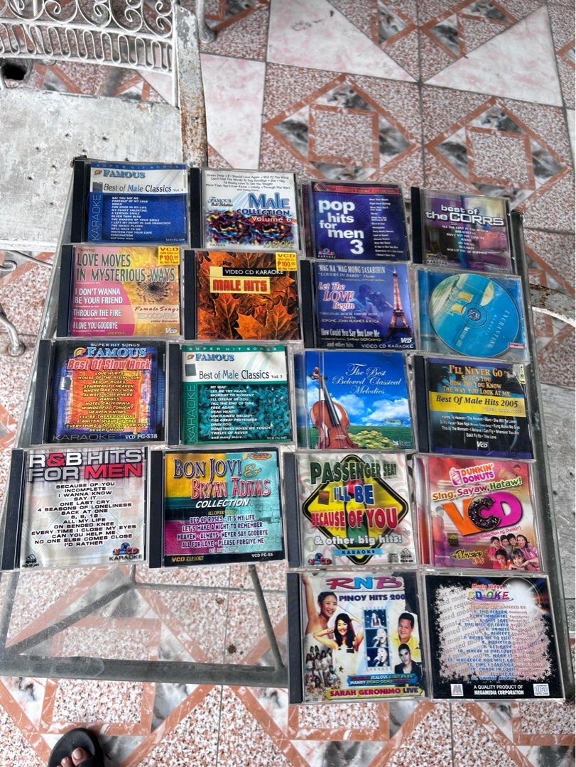 TAKE ALL - Assorted Karaoke VCDs (Category: CDs & DVDs) located in Quezon City. Submitted by declutterwithsandy (Listing ID 1397635734, Image 1). Description: - Karaoke VCD collection - Features various artists and genres - Includes titles like "Best of Male Classics" and "RNB Hits" - Karaoke versions available - Artists include Bon Jovi and Sarah Geronimo - Perfect for karaoke and music lovers.