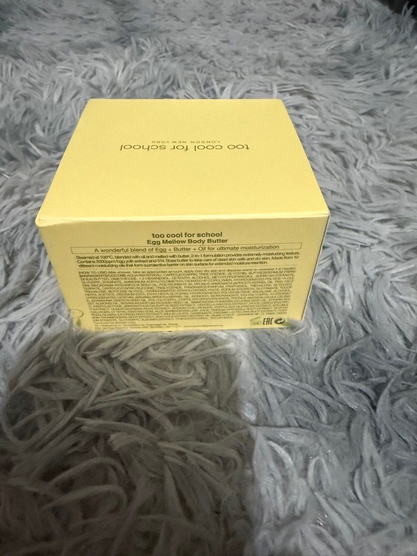 Too Cool For School Egg Mellow Body Butter (Category: Body Care) located in Quezon City. Submitted by dettesy (Listing ID 1397768155, Image 3). Description: Never used, bought in Korea. Intense moisturization with egg and butter extracts. Comes in a yellow box with detailed ingredients and benefits..