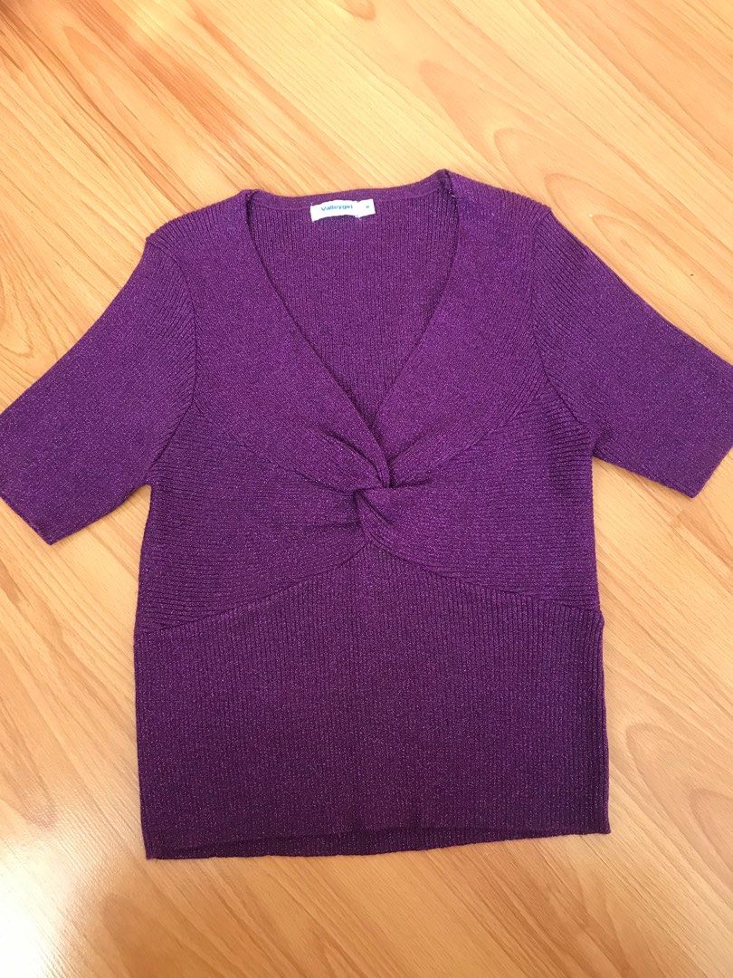 Valleygirl Purple Knot Front Top (Category: Sleeveless) located in Marikina City. Submitted by LoveLocalbyPAF (Listing ID 1397658486, Image 1). Description: - Valleygirl top in size M - Flattering V-neck design - Unique knot detail at the front - Comfortable short sleeves - Stylish ribbed texture - Fabric: 50% Viscose, 35% Polyester, 15% Nylon.