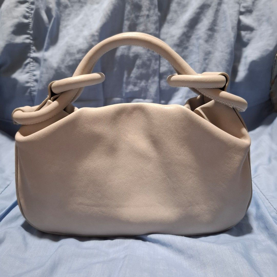 Yearcon Bag (Category: Cross-body Bags) located in Manila. Submitted by mdc08 (Listing ID 1397588675, Image 3). Description: ▪︎Brand new, no tags ▪︎MPO per source (please manage expectations) ▪︎Small, very cute and unique ▪︎Leather with fabric lining; comes with belt-type, adjustable strap ▪︎Silver hardware ▪︎Main compartment with zipper and magnetic closure, 1 zippered pocket ▪︎Dimensions: L 22 x H 14 x W 7.5 cm Reason(s) for Selling: ▪︎Change o