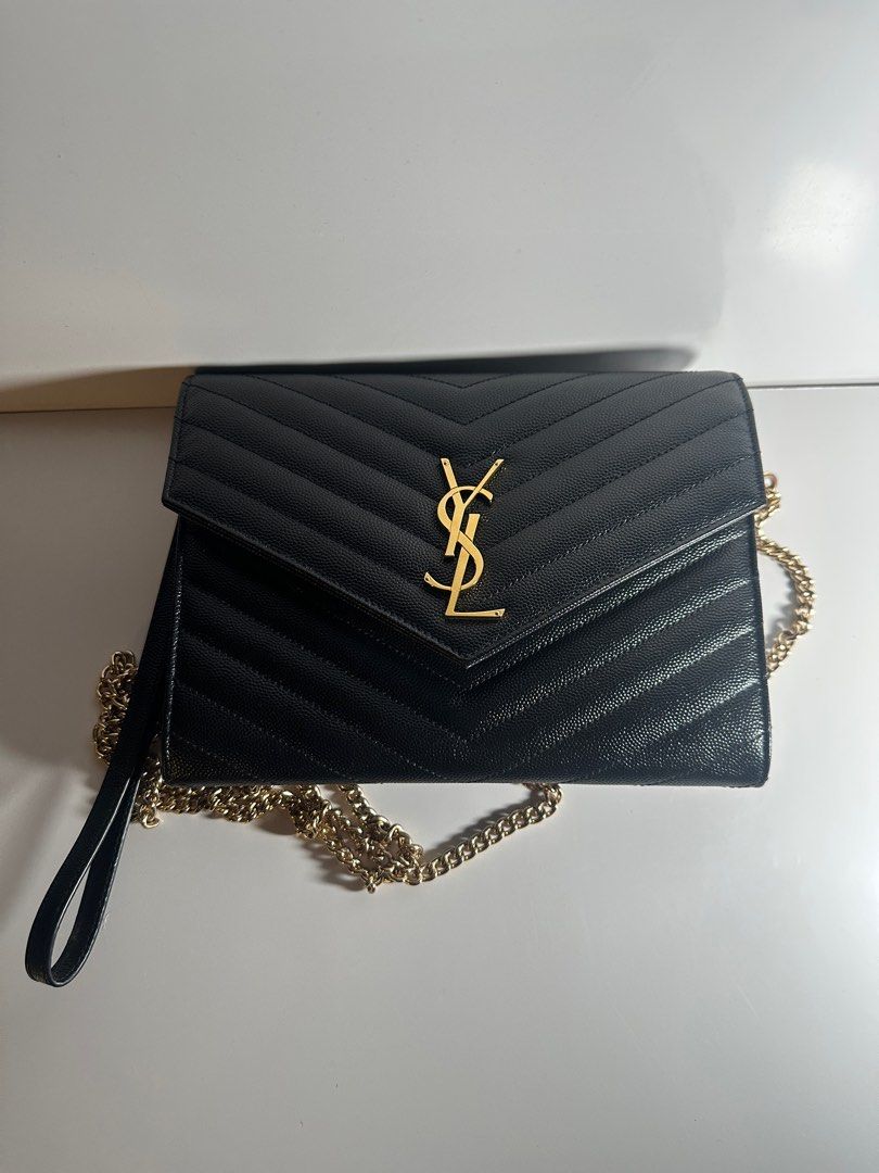 YSL CLUTCH (Category: Luxury Bags & Wallets) located in Palo. Submitted by jomilatte (Listing ID 1397766384, Image 2). Description: CASSANDRE MATELASSÉ FLAP POUCH IN GRAIN DE POUDRE LEATHER like new condition No flaws With Free converter and generic gold chain. With Dust and Paperbag ..