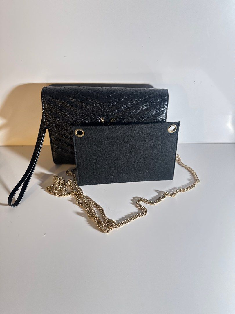 YSL CLUTCH (Category: Luxury Bags & Wallets) located in Palo. Submitted by jomilatte (Listing ID 1397766384, Image 3). Description: CASSANDRE MATELASSÉ FLAP POUCH IN GRAIN DE POUDRE LEATHER like new condition No flaws With Free converter and generic gold chain. With Dust and Paperbag ..