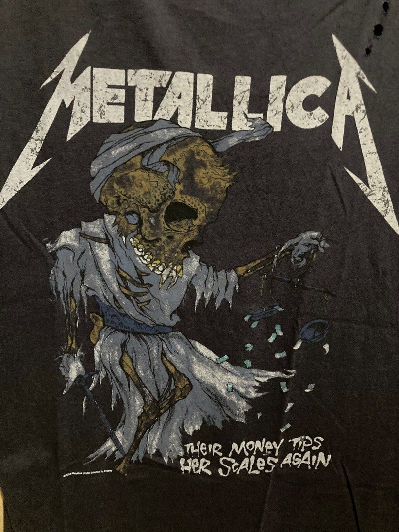 Zara Metallica distressed Style Tee (Category: Tshirts & Polo Shirts ) located in Caloocan City. Submitted by binsbinss (Listing ID 1397637295, Image 3). Description: - Zara Metallica graphic t-shirt - Dark gray color - Size L - Distressed design with holes on the upper left shoulder.