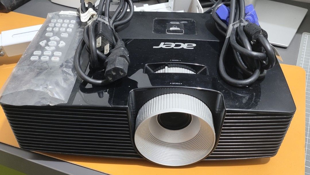 Acer X113P Projector Complete (Category: Projectors) located in Quezon City. Submitted by goodsfree (Listing ID 1397948289, Image 3). Description: Ready for plug-and-play viewing. This 3,000-Lumen DLP Projector is perfect for presentations or casual home theater. What's Included: * Acer X113P Projector * Accessories: Power Cord, VGA Cable, Remote Control. * Setup Gear: Universal Wall/Ceiling Mount Bracket. Key Specs: * Brightness: 3,000 ANSI Lume