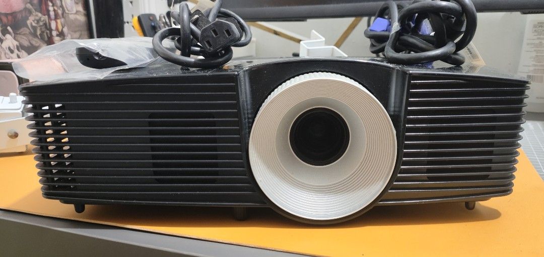 Acer X113P Projector Complete (Category: Projectors) located in Quezon City. Submitted by goodsfree (Listing ID 1397948289, Image 1). Description: Ready for plug-and-play viewing. This 3,000-Lumen DLP Projector is perfect for presentations or casual home theater. What's Included: * Acer X113P Projector * Accessories: Power Cord, VGA Cable, Remote Control. * Setup Gear: Universal Wall/Ceiling Mount Bracket. Key Specs: * Brightness: 3,000 ANSI Lume