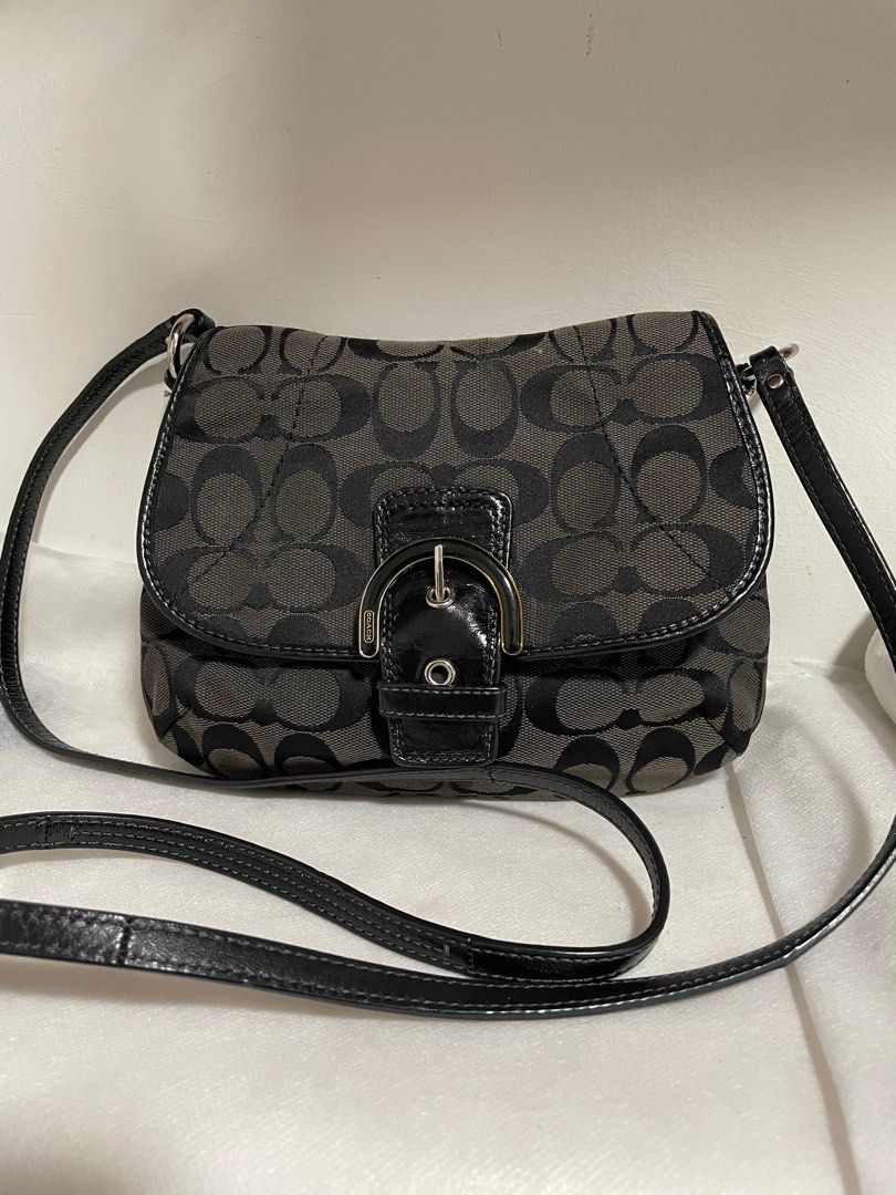 Authentic Coach Signature Soho flap (Category: Luxury Bags & Wallets) located in Guiguinto. Submitted by prelovedinc2024 (Listing ID 1397777749, Image 1). Description: guaranteed authentic, bought in Japan with signs of use - creases silver hardwares - no tarnish no rubs, no cracks size: approx: 9x7”.