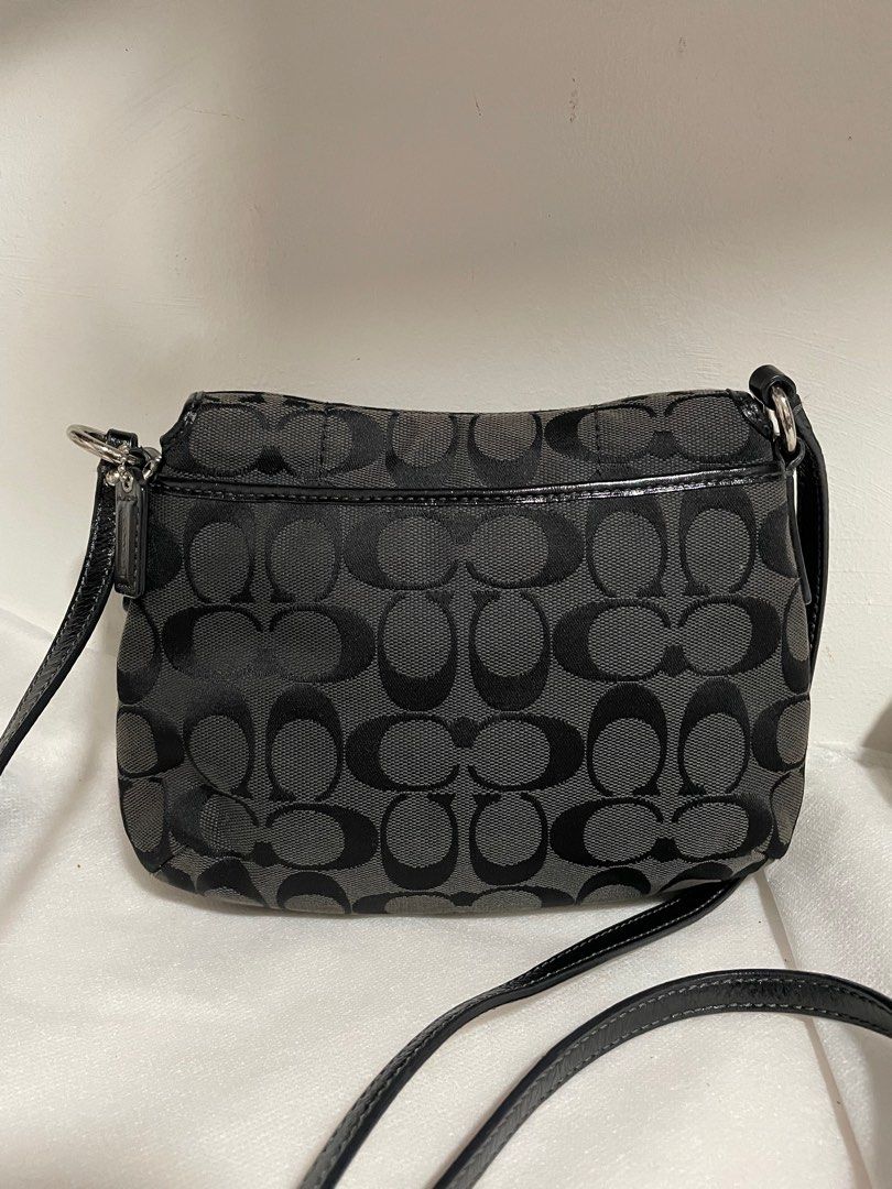 Authentic Coach Signature Soho flap (Category: Luxury Bags & Wallets) located in Guiguinto. Submitted by prelovedinc2024 (Listing ID 1397777749, Image 2). Description: guaranteed authentic, bought in Japan with signs of use - creases silver hardwares - no tarnish no rubs, no cracks size: approx: 9x7”.