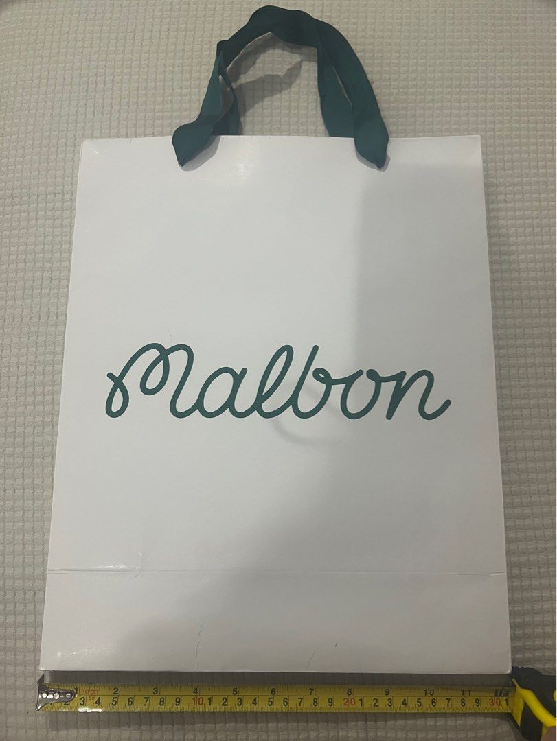 Authentic Malbon Paperbag (Category: Golf) located in Quezon City. Submitted by nxdeclutters (Listing ID 1397955215, Image 3). Description: 15 x 12 x 5 inches Guaranteed authentic, from physical store purchase by my family Oct 2025 RFS: Decluttering Other authentic luxury paperbags available!.