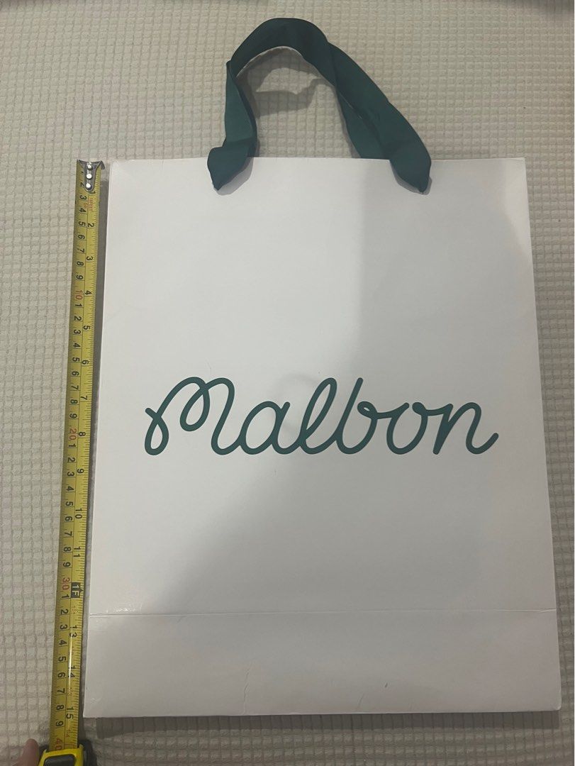 Authentic Malbon Paperbag (Category: Golf) located in Quezon City. Submitted by nxdeclutters (Listing ID 1397955215, Image 2). Description: 15 x 12 x 5 inches Guaranteed authentic, from physical store purchase by my family Oct 2025 RFS: Decluttering Other authentic luxury paperbags available!.
