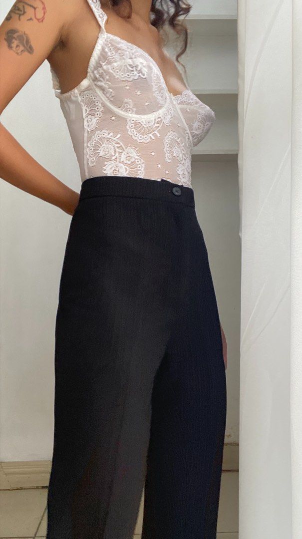 Black Pinstripe Trousers (Category: Other Bottoms) located in Manila. Submitted by raspberryfurs (Listing ID 1397824550, Image 3). Description: - Black pinstripe trousers - High-waisted - Straight leg cut - Button and zipper closure - Suitable for casual or formal wear - Wardrobe essential.