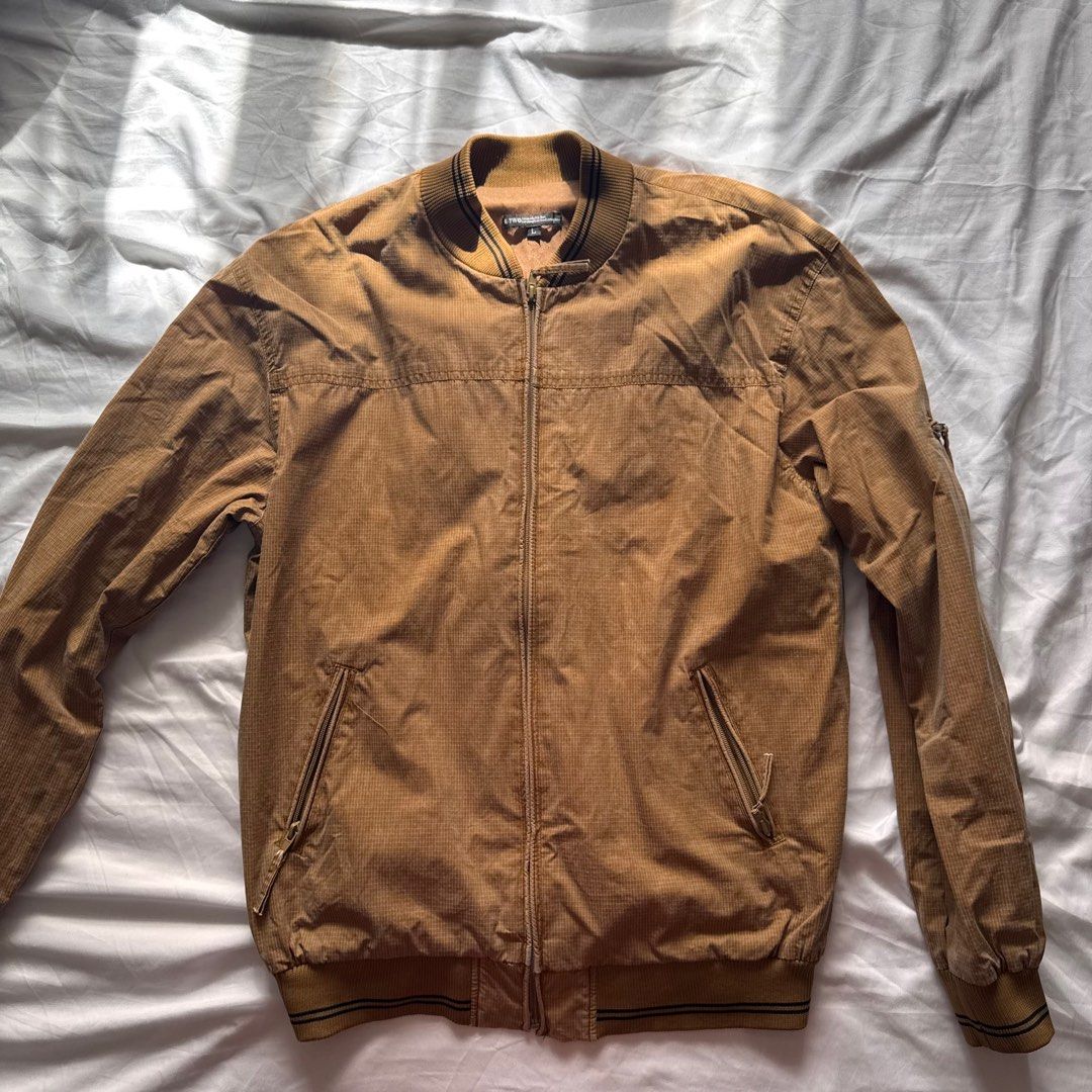 Brown Bomber Jacket | L-XL (Category: Coats, Jackets and Outerwear) located in Manila. Submitted by helloitsjan (Listing ID 1397844568, Image 3). Description: - Brown bomber jacket - Full zip closure - Ribbed collar, cuffs, and hem - Two front pockets - Textured pattern - Perfect for layering.