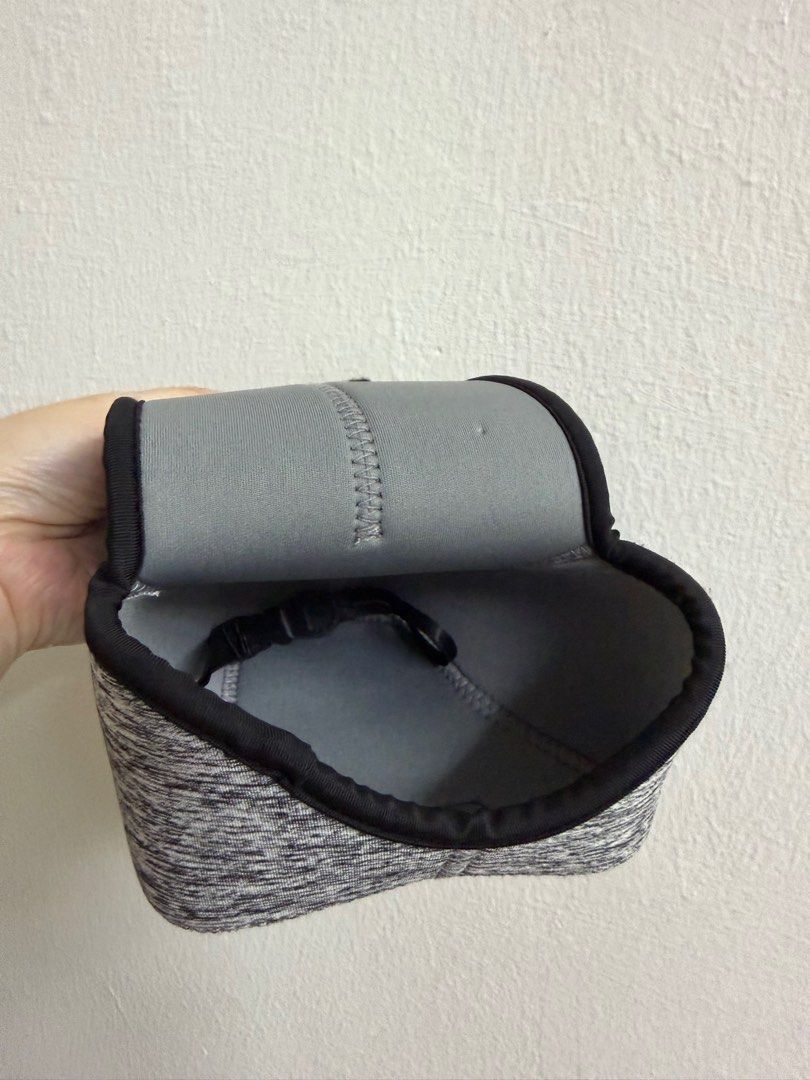 Camera Pouch (Medium) (Category: Camera Bags & Carriers) located in Kuala Lumpur. Submitted by ladygrey77 (Listing ID 1397870882, Image 1). Description: - Compatible with Fujifilm X-T50, X-M5, or similar model. - Stylish gray and black color scheme. - Padded interior for lens safety. - Secure closure to keep your lens safe. - Durable, protective material..
