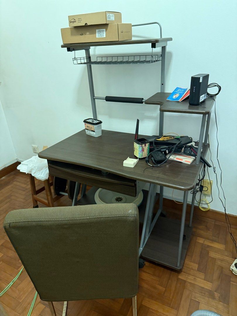 Computer Table (Category: Tables & Sets) located in Singapore. Submitted by impressiveness (Listing ID 1397963614, Image 1). Description: 1 PIANO and 6 FURNITURE FOR SALE: 1 Bed frame with blue mattress cover mattress and pillow (exactly like how it is in the picture) 2 Green Chaise sofa (exactly like how it is in the picture) 3 Greenish Old fashioned traditional table (exactly like how it is in the picture) 4 Brown stylish Modern mirror stand (e